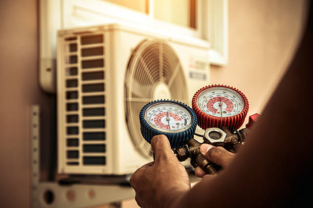 Professional Heat Pump Repair technician working in Bayside, WI